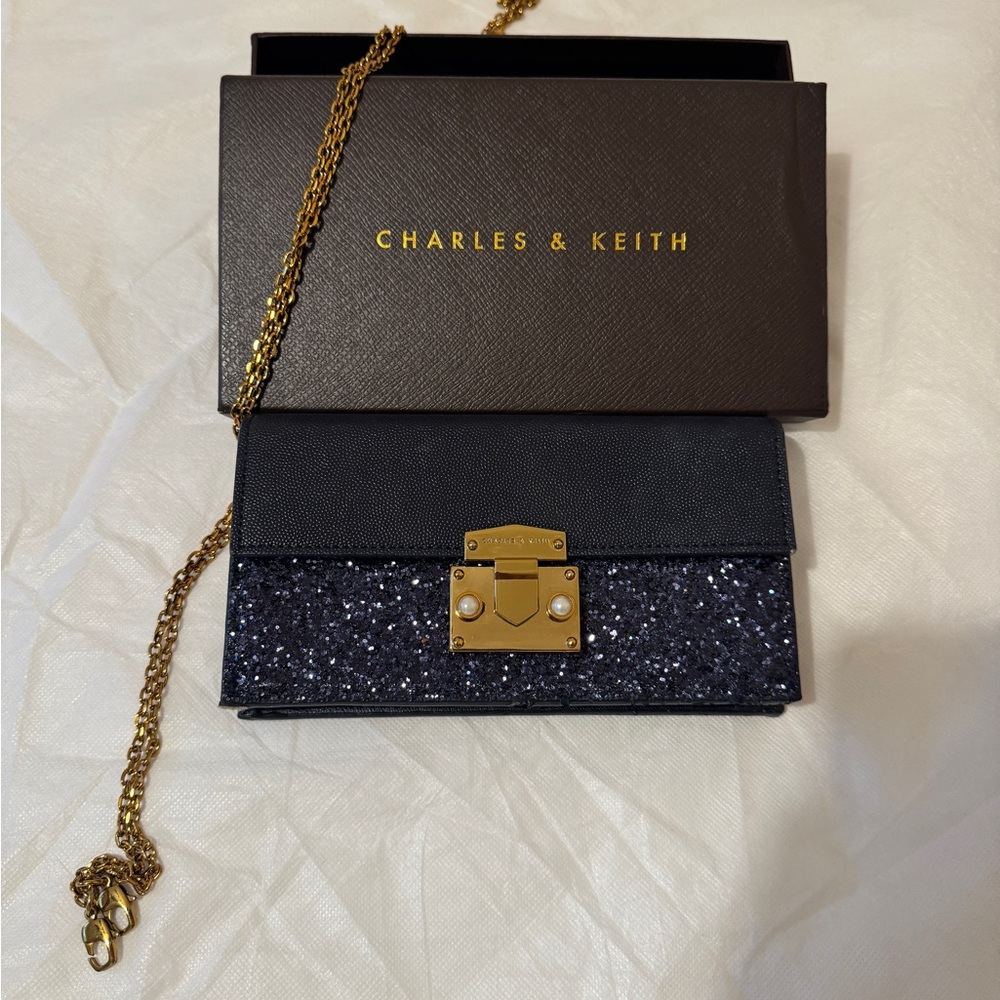Charles & Keith Navy Glitter Clutch with Gold Accents